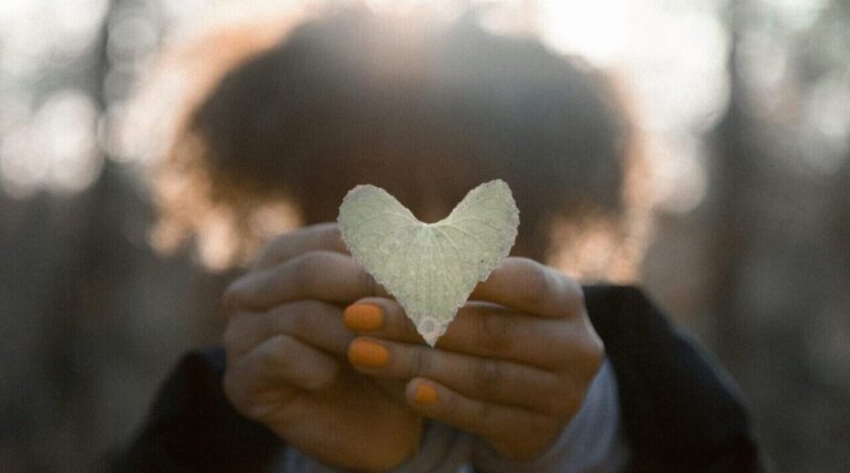 Person with heart shaped leaf